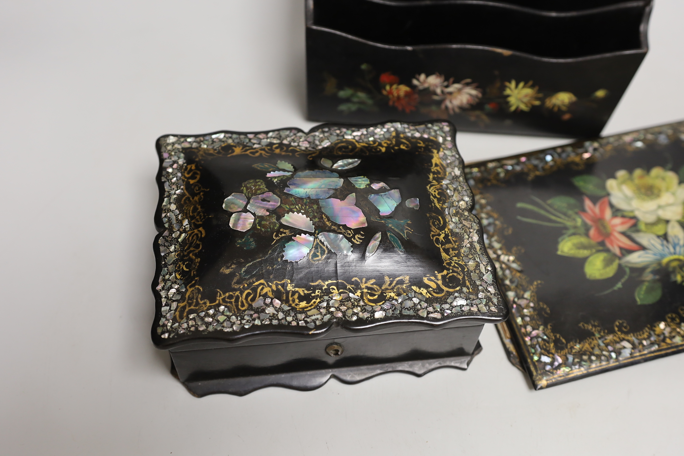 A Victorian mother of pearl papier mache box and blotter and a similar letter rack, box 17.5cm wide, 13cm deep